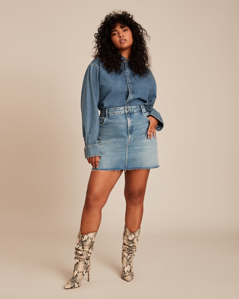 Front of a model wearing a size 20 Good Waist Mini Skirt in BLUE by Good American. | dia_product_style_image_id:225867